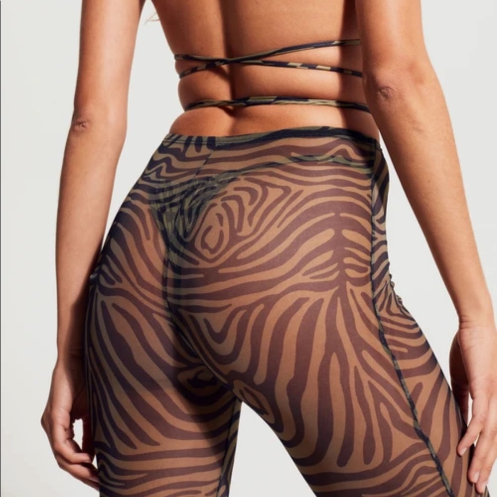 Inamorata beach wood pants size small. Olive zebra. Never worn.